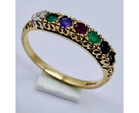 A 9ct gold "Dearest" ring, set with Diamond, Emerald, Amethyst, Ruby, Emerald, Sapphire and Topaz, size P