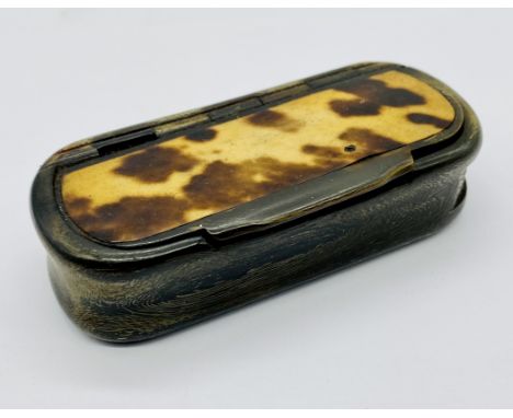 An antique tortoiseshell and horn snuff box