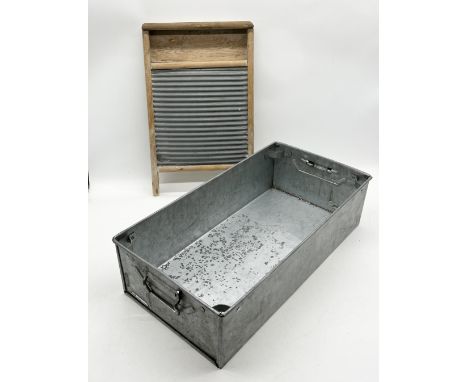 A vintage washboard and galvanised Tote Pan