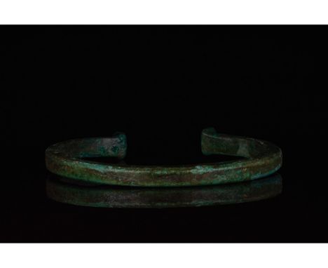 C. 100-300 AD. Roman. A bronze armilla bracelet with rectangular section and sub-elliptical, recurved terminals. Armillae wer