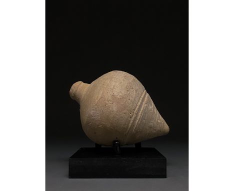 900-1200 AD, Byzantine. Decorated Byzantine "fire grenade" comprising a cream ceramic vessel with a spheroconical body, short