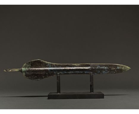 1200-700 BC, Greek Archaic Period. This beautiful bronze dagger has a leaf-shaped, bevelled blade with a prominent midrib, an
