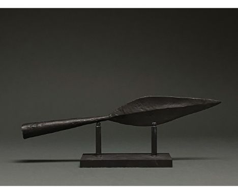 c. 200 BC. Celtic Iron Age. Large iron spear comprising a pointed leaf-shaped blade with a prominent midrib and round, conica