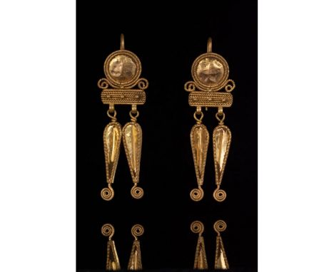 100-300 AD. Roman period. An elaborate pair of gold earrings each comprising (from top to bottom): a rounded suspension loop 