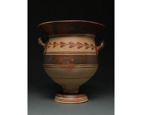 600-200 BC. Apulia. Daunian bell krater with flaring rim, bell-shaped body, rounded stem, disc-shaped base and two lug handle