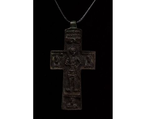 1000-1500 AD. Medieval Crusaders period. Large bronze Latin cross with rounded suspension loop and moulded decoration showing