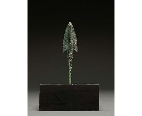1200-700 BC, Greek Archaic Period. Bronze Age. A bronze spearhead with a broad leaf-shaped, lentoid sectioned blade, a raised