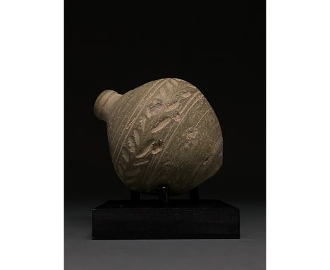 900-1200 AD, Byzantine. Decorated Byzantine "fire grenade" comprising a grey ceramic vessel with a spheroconical body, short,