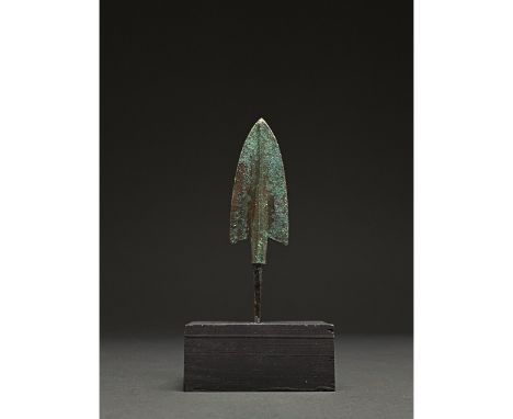 1200-700 BC, Greek Archaic Period. Bronze Age. A bronze spearhead with a broad leaf-shaped, lentoid sectioned blade, a raised
