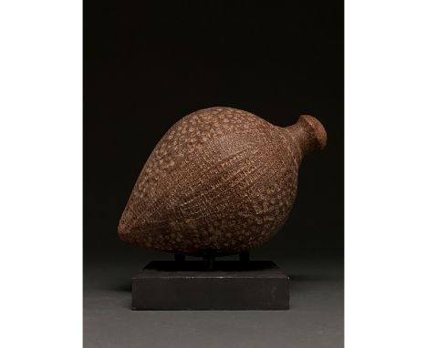900-1200 AD, Byzantine. Decorated Byzantine "fire grenade" comprising a brownish-red ceramic vessel with a spheroconical body