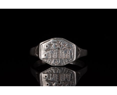 300-450 AD. Late Roman. Silver ring with circular hoop and octagonal bezel bearing a rare incised camp gate motif topped by t