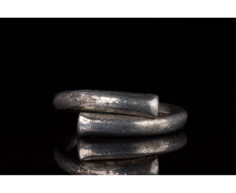 500-1 BC, Celtic Iron Age. Simple, open hoop silver ring with overlapping terminals and a circular section. This simple yet e