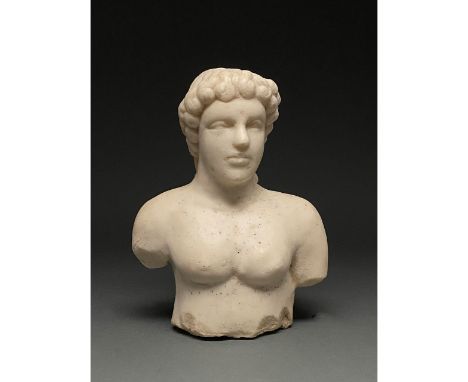 100 AD or later. Roman-style. Rectangular Roman-style marble head and torso of a youth with two-tiered curling locks, simple,