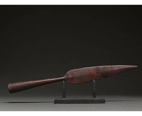 C. 300-500 AD Roman. A large iron spearhead comprising a slender leaf-shaped, lentoid sectioned blade with a slightly raised 