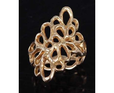 A 1970s 18 carat gold dress ring, of all over pierced abstract form, maker AB, London 1972, 7.5g, size K½