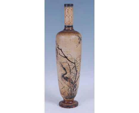 A Martin Brothers stoneware vase, the cylindrical neck over shouldered slightly tapering body, to spreading foot, incise deco