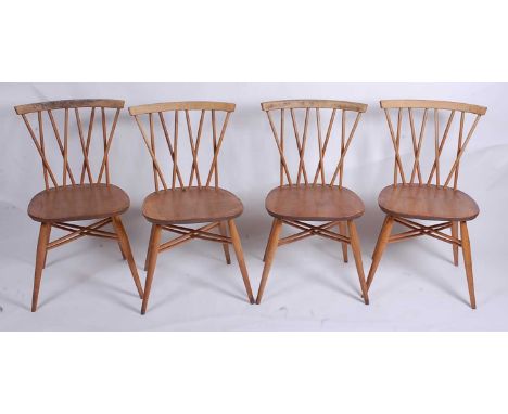 A set of four 1960s Ercol light elm candlestick kitchen chairs, model No.3462, w.41.5cm