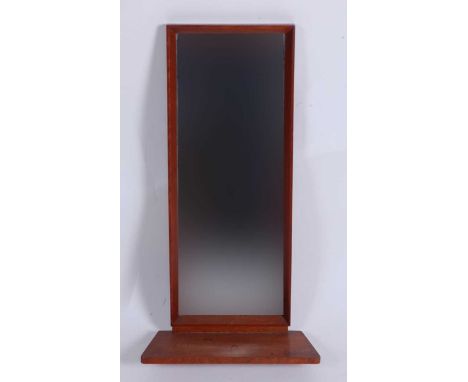 A small 1960s teak mirrored wall shelf, with lower integral platform, 56 x 30cmCondition report: Overall very good and origin