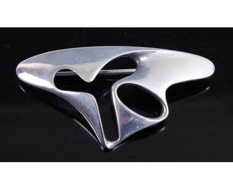 Henning Koppel (1918-1981) for Georg Jensen - a sterling silver abstract stylised brooch, stamped marks and numbered 325 vers