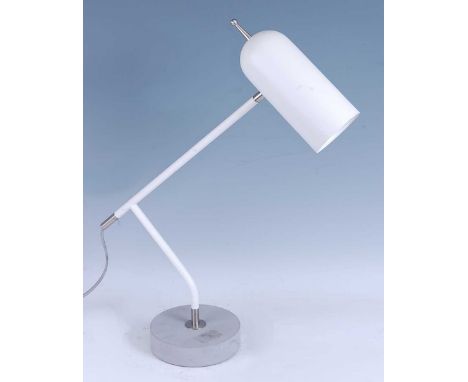 A contemporary white enamelled rod metal angular desk lamp, with adjustable shade, brushed aluminium mounts and raised on int