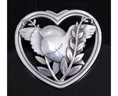 Arno Malinowski (1899-1976) for Georg Jensen - a sterling silver heart shaped brooch, decorated with a robin within foliage, 