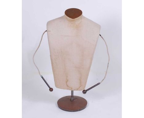An early 20th century French anodised metal and hessian cloth fabric covered shop display mannequin, having moveable rod arms