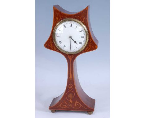 An Art Nouveau mahogany and floral satinwood inlaid mantel clock, the case of stylised tulip form with circular white enamel 