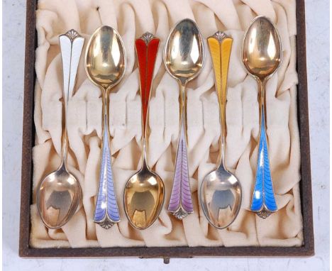 A set of six Norwegian Art Deco silver gilt and enamel decorated spoons by David Andersen, each with a spreading handle and d