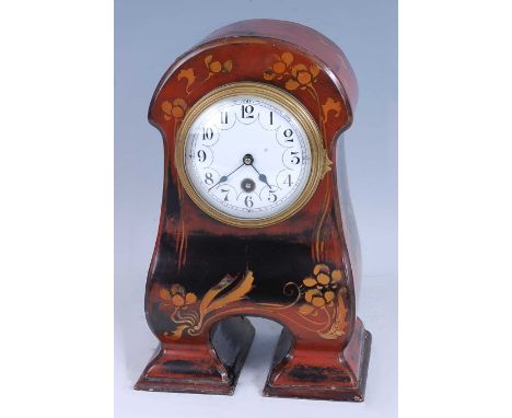 An Art Nouveau lacquered wood mantel clock, the shaped case floral stylise decorated in tones of red, black and ochre, the wh