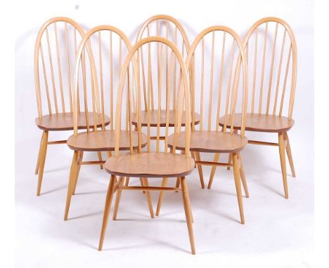 A set of six Ercol light elm stickback dining chairs, labelled verso, w.44cm