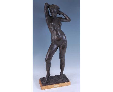 Elisabeth Hadley (b.1967) - Ariadne, large full-length standing female nude, bronzed composition, raised on titled light oak 