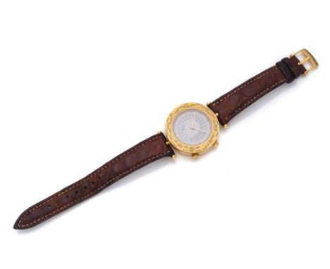 Herrenuhr VAN CLEEF AND ARPELSSchweiz um 1990L. 23 cm, D. 35.5 mmModell Traveller 750/000 Gelbgold gestempelt, Seriennummer N