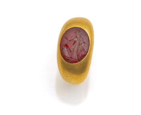 Ring mit Gemme „Athena“Römisch wohl 3.Jh. n. Chr.RM 5221kt Gelbgold (getestet), Karneol. Ca. 6,9g.Privatsammlung Baden-Württe