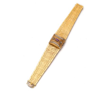 OMEGA SchmuckbanduhrL. 18 cm750/000 Gelbgold gestempelt, mit einem Deckel gefasst mit 3 Rubinen und 20 Achtkant Diamanten ca.