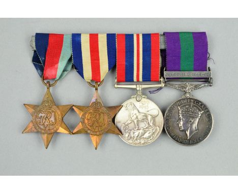 A SWING MOUNTED WWII GROUP OF MEDALS, 1939-45, France & Germany Stars, War medal (un-named as issued) and George VI General S