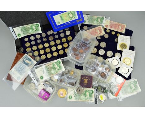 A BOX CONTAINING MAINLY BRITISH COINAGE AND BANKNOTES, to include sixteen various designs of five pound coins, approximately 