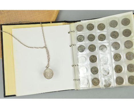 A COIN ALBUM, with mainly UK coins, to include a William IV shilling coin 1834, along with a mounted silver Half Dollar Kenne