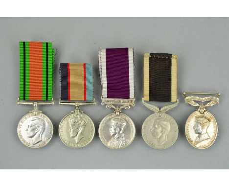 FIVE ASSORTED WWI/WWII ERA MEDALS, Army Long Service medal Geo V named to 7868974 Sjt F. Sketcher, Royal Tank Regiment, Effic