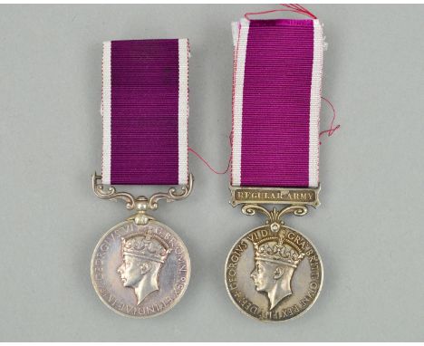 TWO GEO VI CROWNED HEAD ARMY LONG SERVICE MEDALS, named to 2321967 possibly Cpl ? (medal is damaged) A. North. Royal Signals,