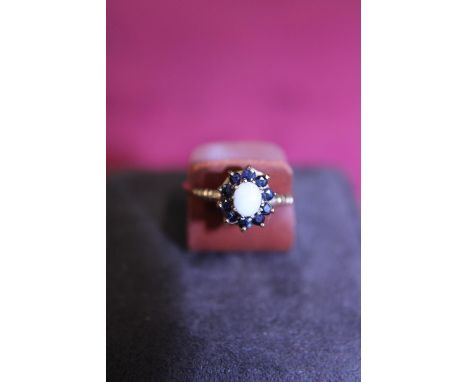 A vintage 9ct gold opal and sapphire ring 1.51g size O 