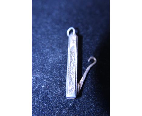 A hallmarked silver handled button hook 