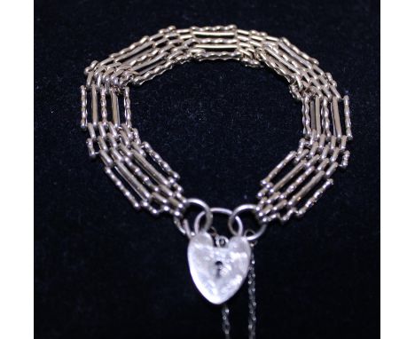 A hallmarked 9ct gold padlock and gate bracelet 19.80g 