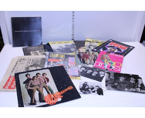 A job lot of vintage pop memorabilia including Rolling Stones, The Beatles etc 