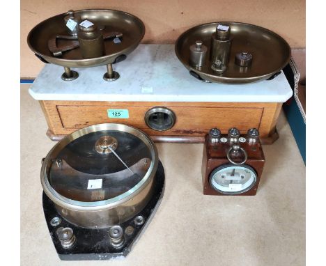 A set of marble top scales and various weights; a brass voltmeter; etc. 