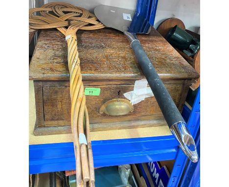 An oak slope top writing desk; a carpet beater; a large skillet; 2 boxes; kitchenalia etc. 