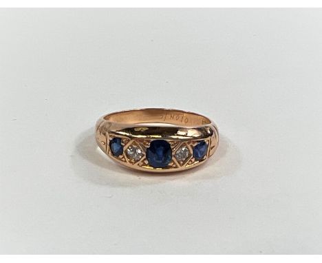 A Victorian 18ct gold dress ring with 3 sapphires and two diamonds&nbsp;size K - L.&nbsp;&nbsp;Hallmark year 1907-8 (Edwardia