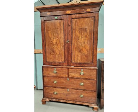 A George III figured mahogany chest on chest with Sheraton style shell and floral marquetry inlay, the upper section with mou