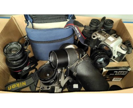 A Nikon F80 camera with AF Nikkor 20mm f2.8 lens, a Helios and 2 others by Prinz (200m) and Kenlock; a Canon camera 