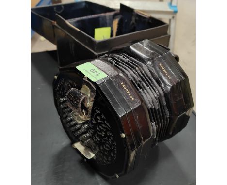 "The Edeophone" English concertina by Lachenal &amp; Co no. 56620 with pierce ebonized sides and 24 buttons to each side, in 