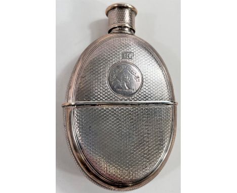 A silver hip flask and stirrup cup with engine turned decoration and circular crest 'Suum Cuique' with unicorn, London 1860, 